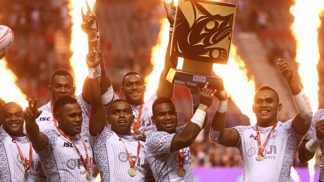 Fiji celebrate with the trophy after defeating Kenya to win the gold medal game at Canada Sevens.