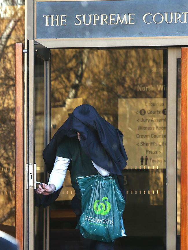 David William Michaelson leaves the Supreme Court in Hobart after sentencing