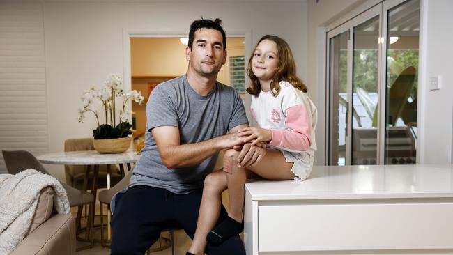 Joseph Price and his daughter Willow (9). He is one of 1000 workers whose jobs are at risk with Origin not committing to renewing its contracts with Centennial Coal. Picture: Richard Dobson