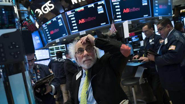 NEW YORK, NY - FEBRUARY 2: Traders and financial professionals work on the floor of the New York Stock Exchange (NYSE) at the closing bell, February 2, 2018 in New York City. The Dow dropped 250 points at the open on Friday morning. The Dow plunged over 660 points on Friday, marking its biggest one day plunge since June 2016 following the Brexit vote.   Drew Angerer/Getty Images/AFP == FOR NEWSPAPERS, INTERNET, TELCOS & TELEVISION USE ONLY ==