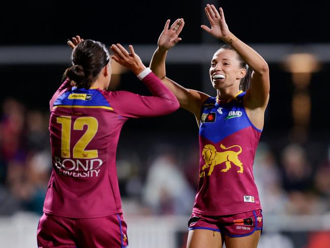 BRISBANE, AUSTRALIA - SEPTEMBER 13: Sophie Conway of the Lions celebrates a goal during the 2024 AFLW Round 03 match between the Brisbane Lions and the Collingwood Magpies at Brighton Homes Arena on September 13, 2024 in Brisbane, Australia. (Photo by Russell Freeman/AFL Photos via Getty Images)