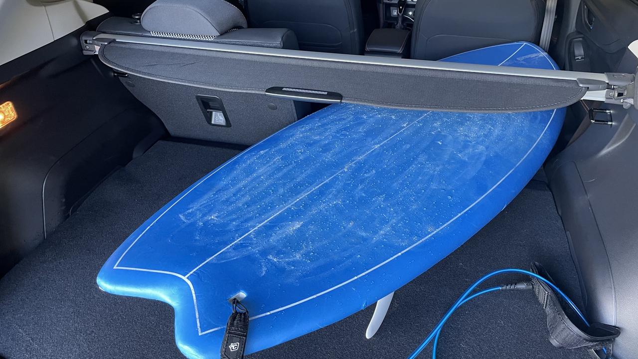 Subaru's XV handles a short board with the rear seats collapsed.