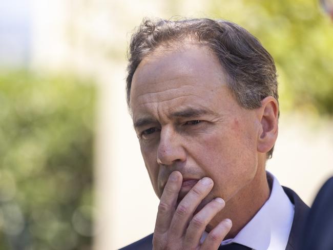 Health Minister Greg Hunt looks on as Prime Minister Scott Morrison delivers the Royal Commission Report into Aged Care. Picture: Getty Images