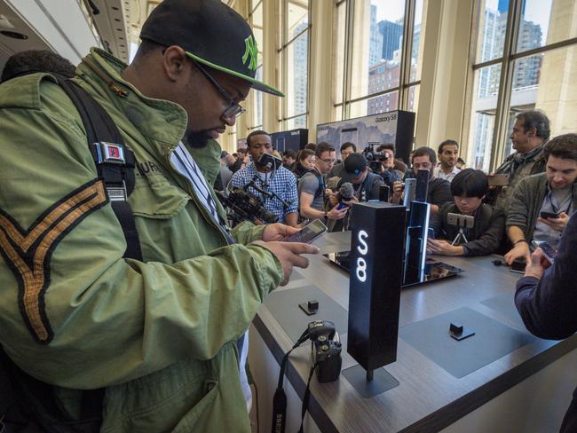 People test out the new Samsung Galaxy S8 at its launch in New York. Picture: Supplied