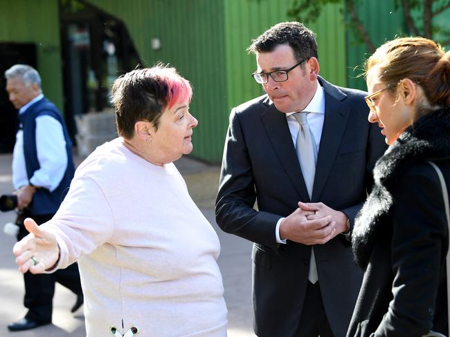 A local resident alerts Mr Andrews about the overdose. AAP Image/Joe Castro