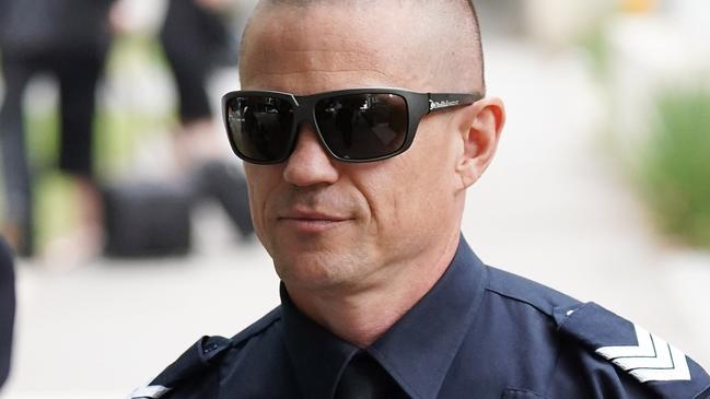 Sergeant Matthew Peck leaving the Bourke St inquest yesterday. Picture: AAP Image/Stefan Postles