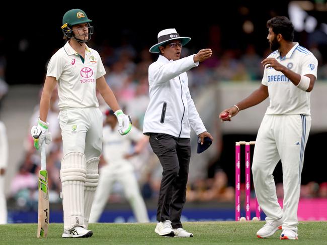 Umpire Sharfuddoula intervenes as Australian opener Sam Konstas and Indian captain Jasprit Bumrah exchange words Picture: AFP