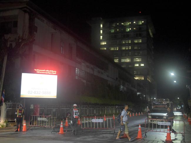 Police barricade a road leading to the hospital where the first boys were taken. Picture: AFP