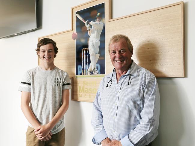 Scott Mason’s dad Winston Mason, right, and his nephew Lachie Mason with the new honour board. Picture: MATHEW FARRELL