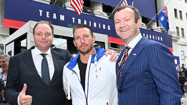 F45 CFO Chris Payne, F45 Founder and CEO Adam Gilchrist, and F45 Chief Revenue Officer Luke Armstrong pose outside as F45 Training rings the opening bell at the New York Stock Exchange.