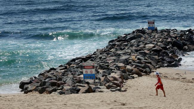 A geotech sandbag wall would be cheaper than the rock groyne built on The Entrance Beach in 2017. (AAP Image/Sue Graham)