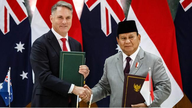 Indonesia's Defence Minister and president-elect Prabowo Subianto, right, with Defence Minister Richard Marles in Magelang, Indonesia, on Thursday. Picture: AFP