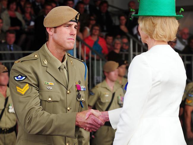 Governor-General Quentin Bryce congratulates Corporal Ben Roberts-Smith of the Special Air Service Regiment after Roberts-Smith was awarded a Victoria Cross during an investiture ceremony at Campbell Barracks in Swanbourne, Western Australia 23/01/2011. Roberts-Smith received the award for his gallantry under fire during operations in Afghanistan 06/2010 and became the 98th Australian recipient of the award.