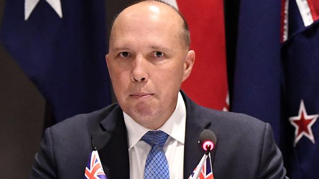 Peter Dutton has faced queries over his eligibility to sit in parliament over family interests in childcare centres that have received government subsidies. Picture: AAP