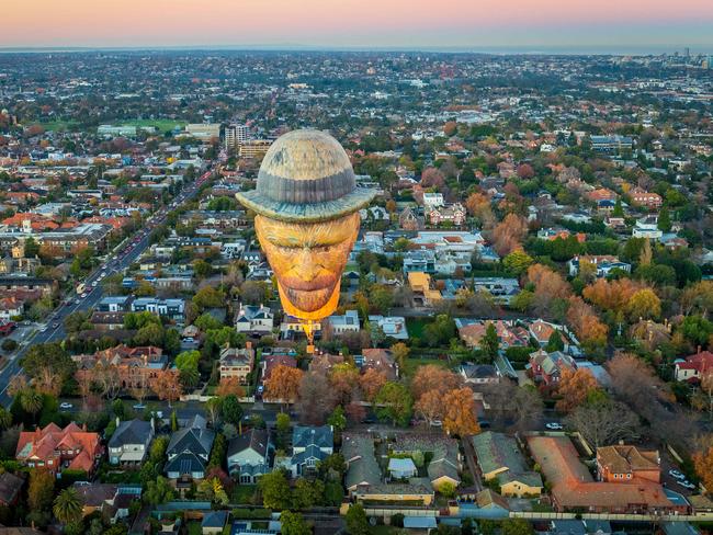 The balloon crept across the city as many slept. Picture: Jake Nowakowski