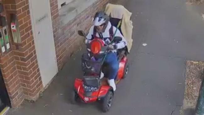 CCTV vision released by police shows a man riding away on a mobility scooter on November 8. Picture: NSW Police