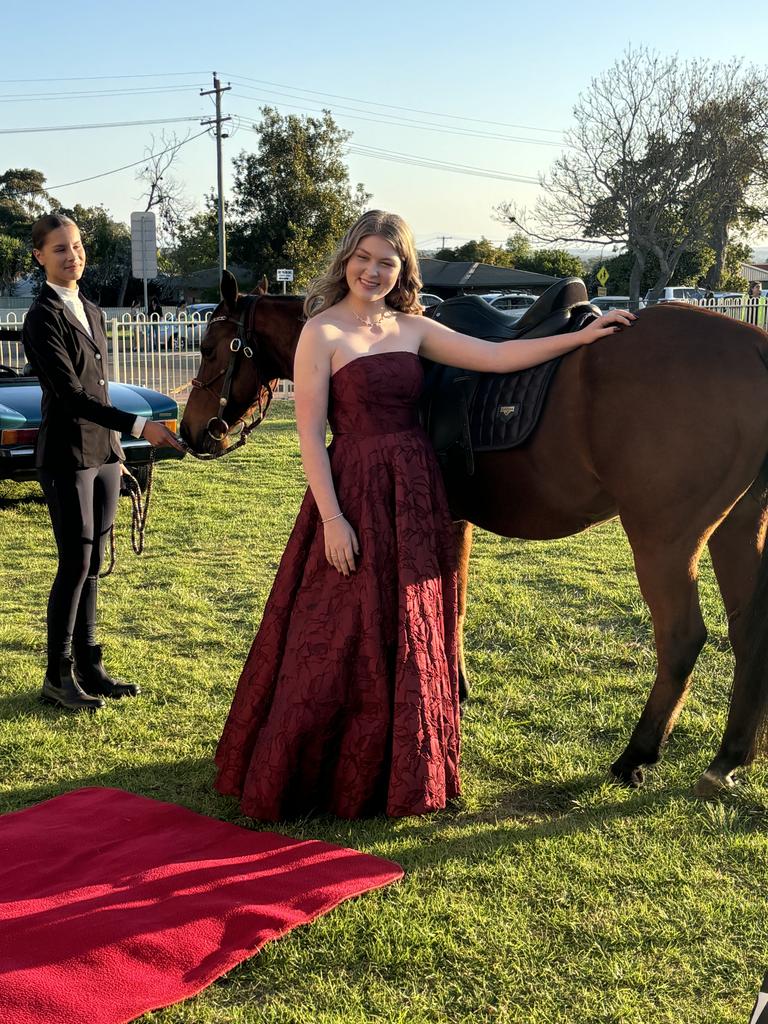 Maggie Livett arrives at Kingaroy's St John's Lutheran School formal on horseback.