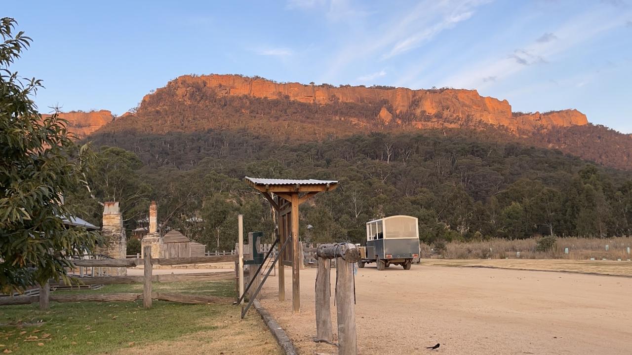 The valley cliffs turn a stunning orange at sunset.