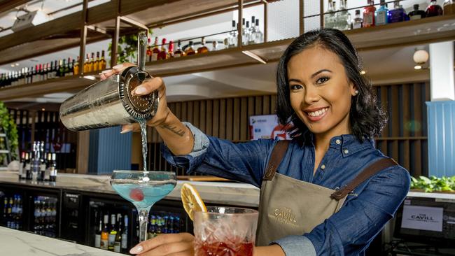 Bartender Kristine Gillingham behind The Cavill Hotel bar. Picture: Jerad Williams