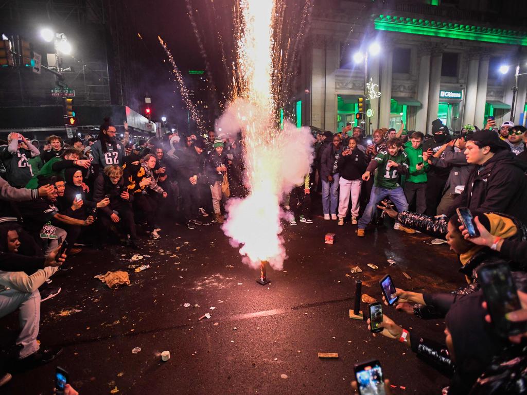 Philadelphia's Wild Celebration: Champagne, Fireworks, and Climbing Poles