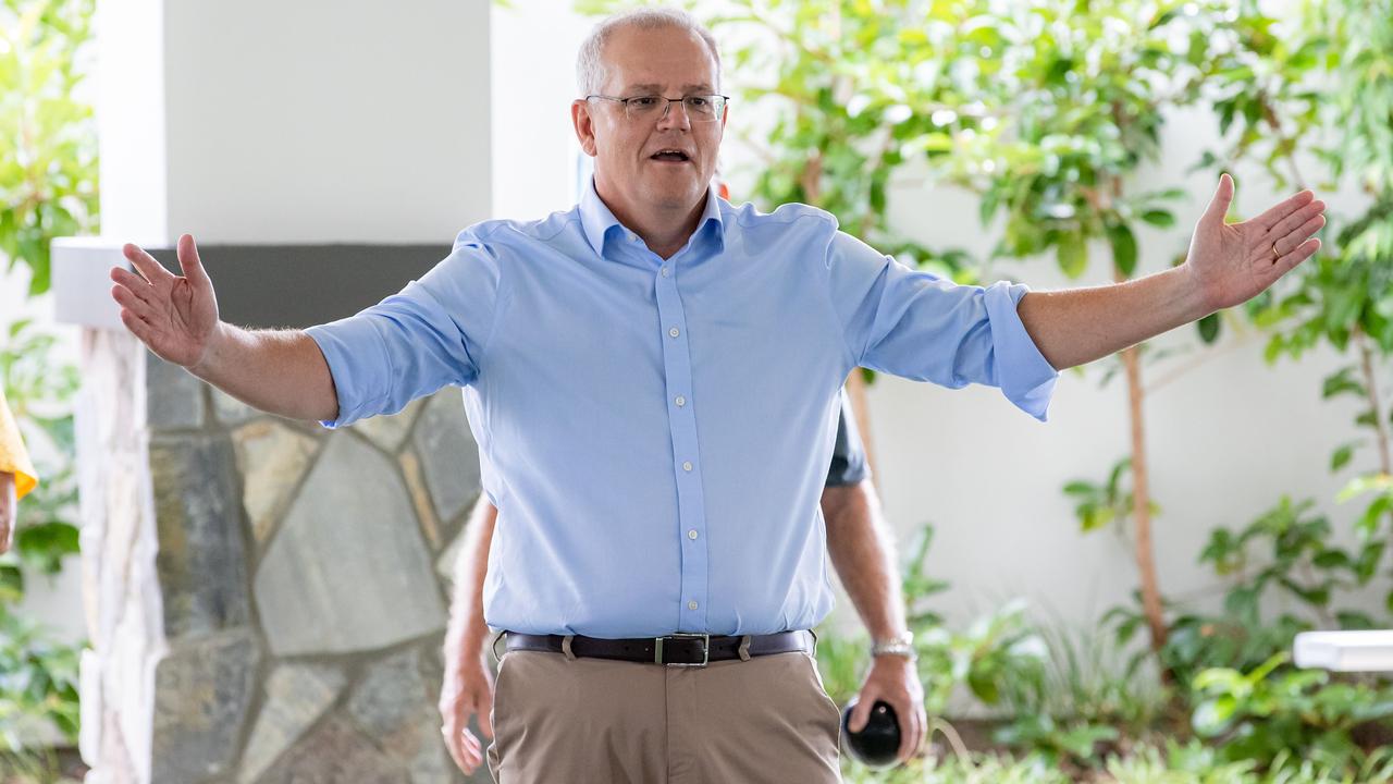 Scott Morrison on a bowling green at a retirement village in Brisbane on Thursday. Picture: Jason Edwards