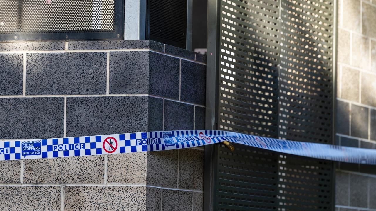 Police at a crime scene after a suspected arson of the toilet block in Lake Annand. Picture: Kevin Farmer