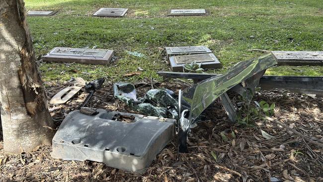 A car left the road and crashed through a hedge and over Memorial plaques at Allambe Memorial Park in Nerang.