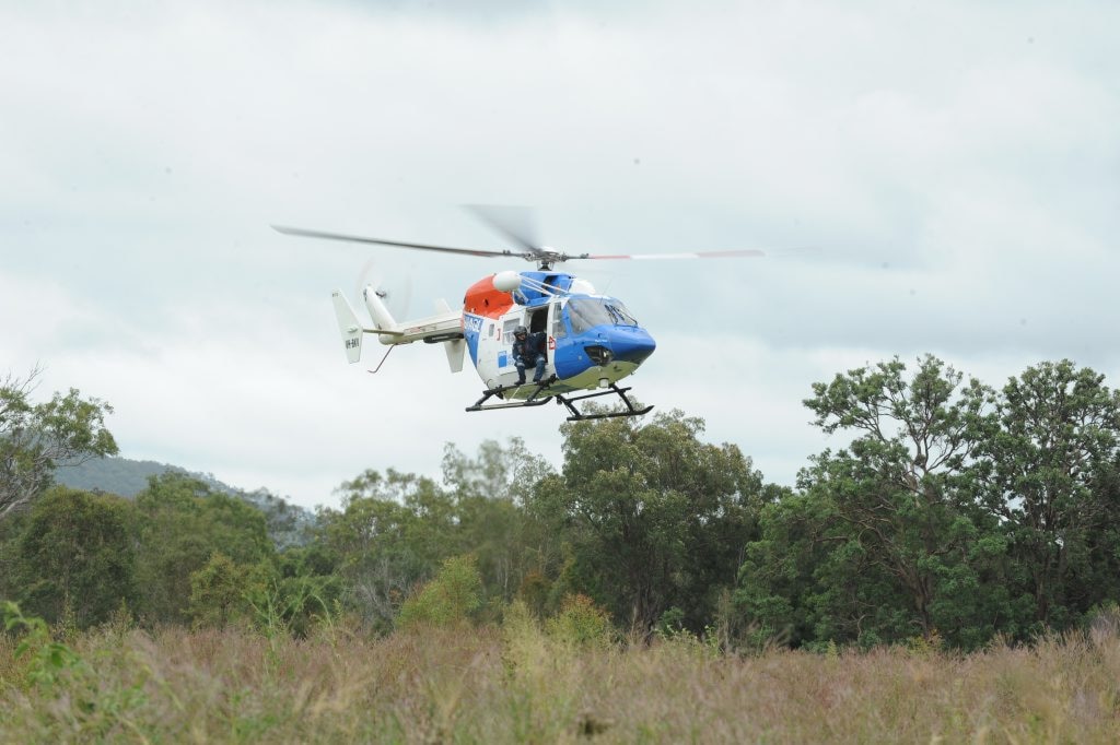 SEARCH TEAM: The AGL rescue helicopter lifts off for another sweep of the surrounding bushland in the search for missing motorcyclist Paul Stevenson. Photo: Mike Knott / NewsMail. Picture: Mike Knott