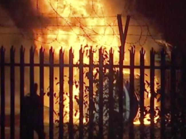 This image made from video shows a burning helicopter in a parking lot outside the King Power Stadium in Leicester, England shortly after a Premier League game on Saturday, Oct. 27, 2018. (Pool Photo via AP)