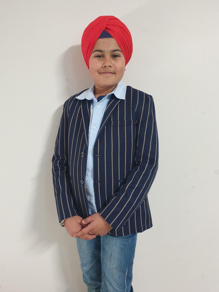 Onkarveer Singh Khalsa spent his 10th birthday donating hotdogs and soft drink to the less fortunate down at Tony's Kitchen.