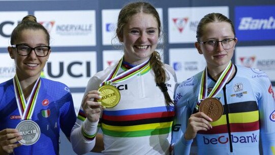 Central Coast cyclist Nicole Duncan wins a world crown in the scratch race at the junior worlds. Pics: Supplied