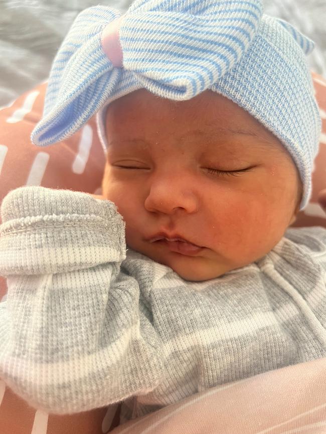 Aurora Bond. Four weeks old. Aurora is named after Sleeping Beauty and lives up to her name.