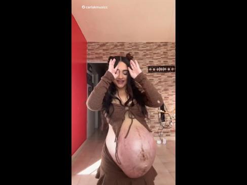 woman reveals enormous baby bump