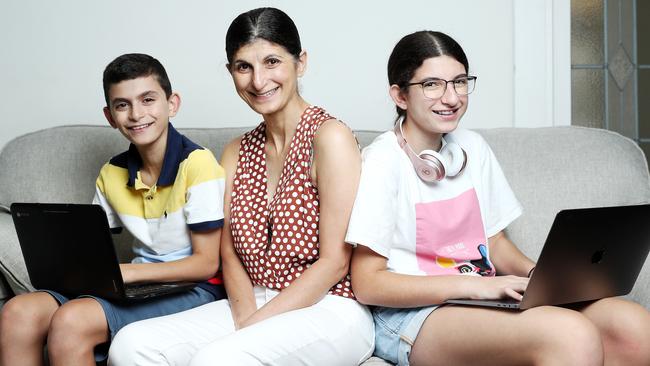 Marie-Claire Abdullah and her children Georgia, 16, and Jonathon, 14. Picture: Tim Hunter.