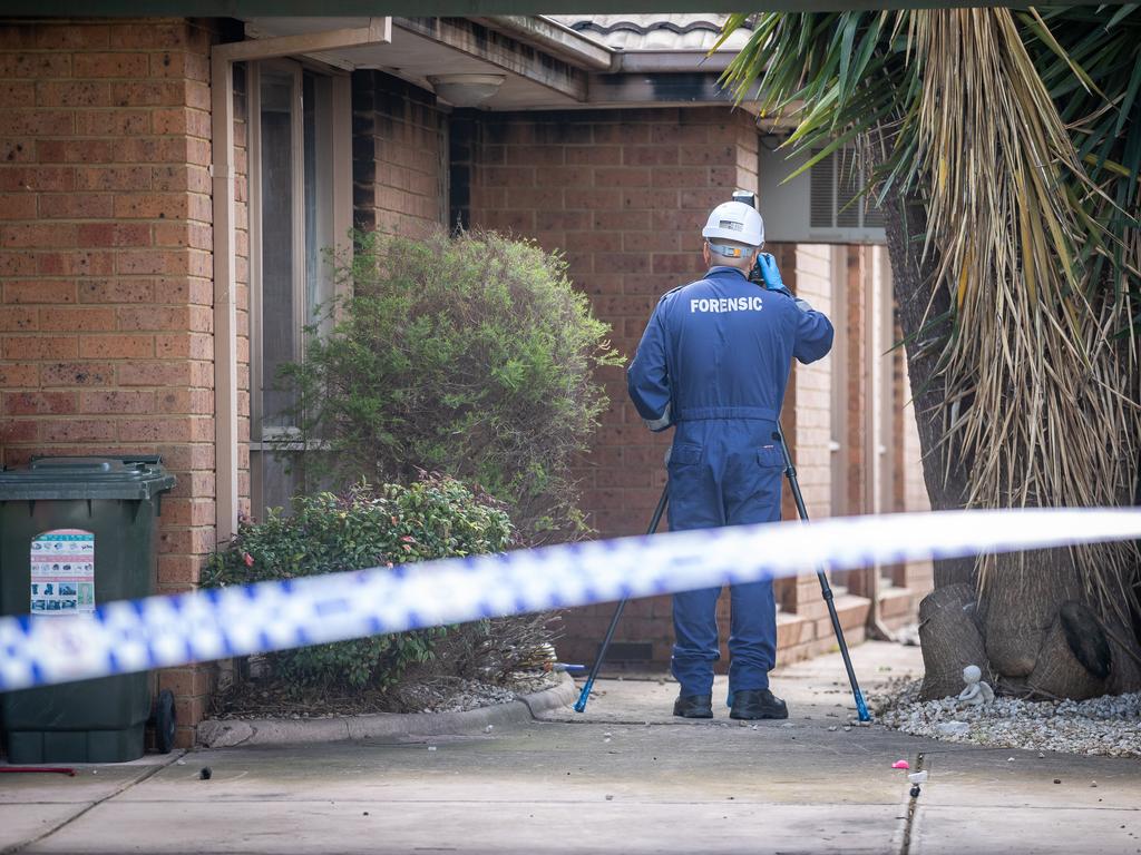 Police at the scene. Picture: Jake Nowakowski