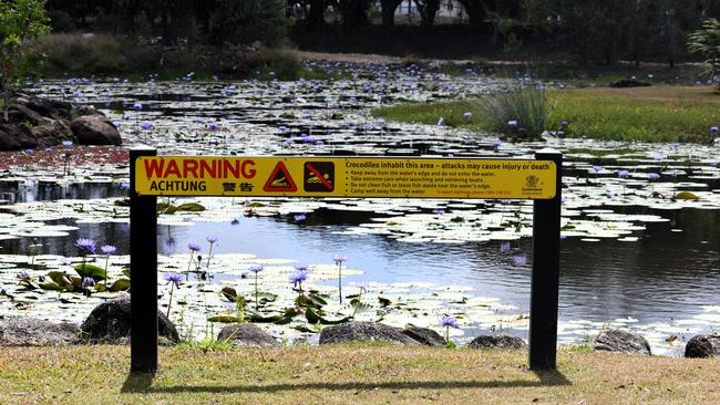 A highly visible, prominently placed sign warning of the dangers of crocodiles at the Tyto Wetlands in the middle of Ingham, Hinchinbrook Shire. Picture: Cameron Bates