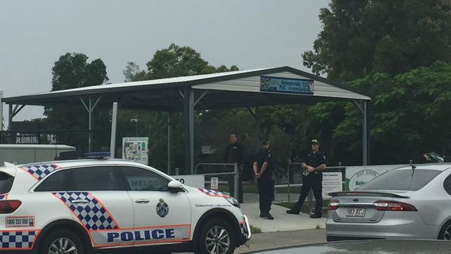 Police at Helensvale State School after a bomb threat put the school into lockdown.