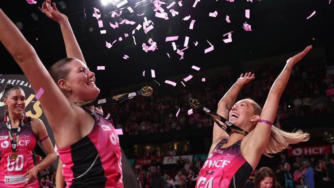 Lauren Frew of the celebrates with Lucy Austin after the Adelaide Thunderbirds secured back-to-back Super Netball premierships this year. (Photo by Maya Thompson/Getty Images)