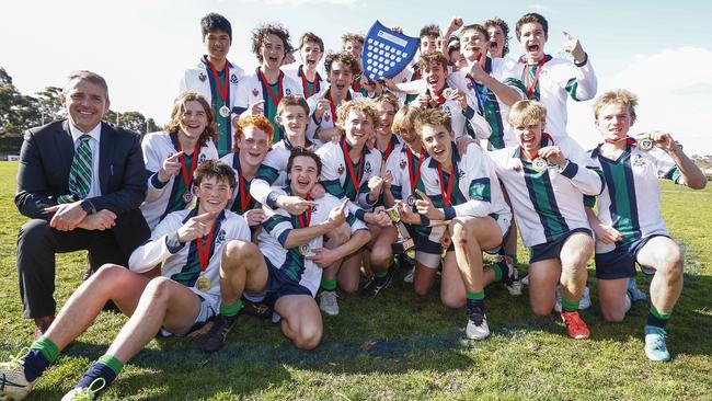 St Patrick's College celebrate winning the Herald Sun Shield Intermediate Boys Grand Final between Parade College and St Patrick's Ballarat at Box Hill City Oval. Picture: Daniel Pockett/AFL Photos/via Getty Images