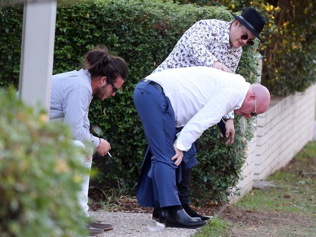 People leaving the Melbourne Cup Day at Eagle Farm. Picture: AAP/Richard Gosling