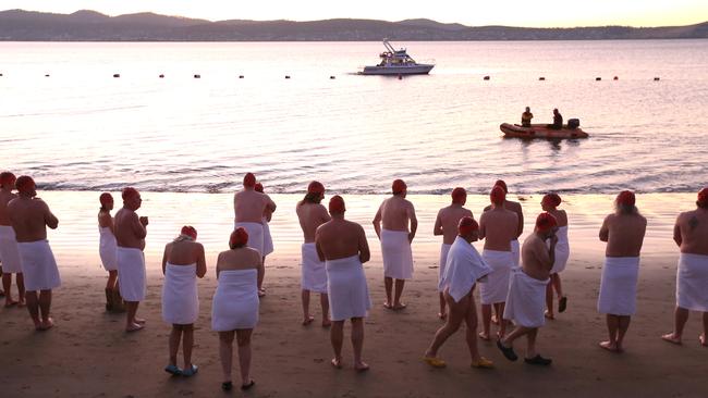 First time and long time nudists prepare to de-towel. Source: Nikki Davis-Jones