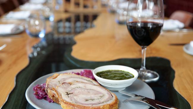 The overnight roasted Roman-style porchetta with salsa verde and pickled red cabbage. Pictures: Martin Lange.