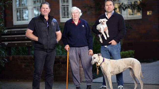 Real estate agent Danny Dofft and agent Richard Buttrose helped Colin get permission to keep Bu in his unit. Picture: Christian Gilles