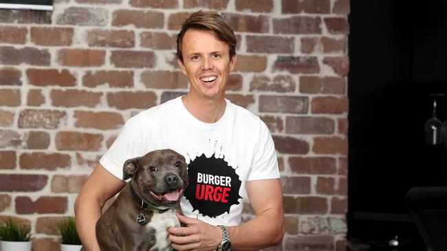 Burger Urge founder Sean Carthew and pet pooch Grug. Picture: Tara Croser.