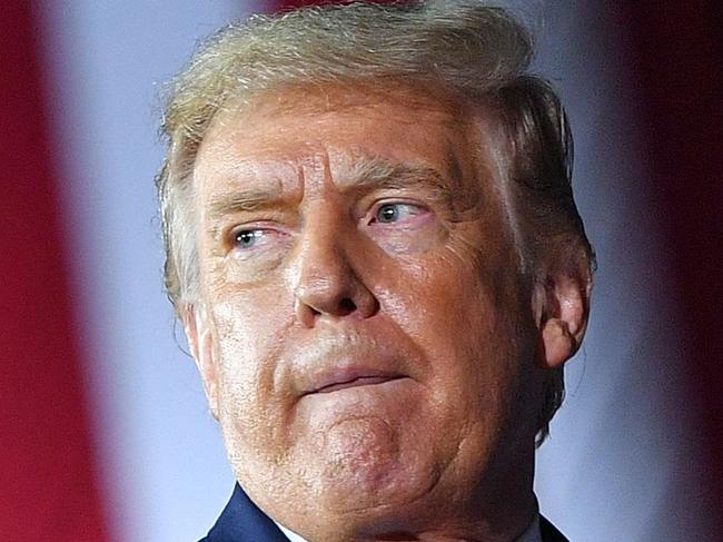 TOPSHOT - US President Donald Trump gestures during a campaign rally at MBS International Airport in Freeland, Michigan on September 10, 2020. (Photo by MANDEL NGAN / AFP)