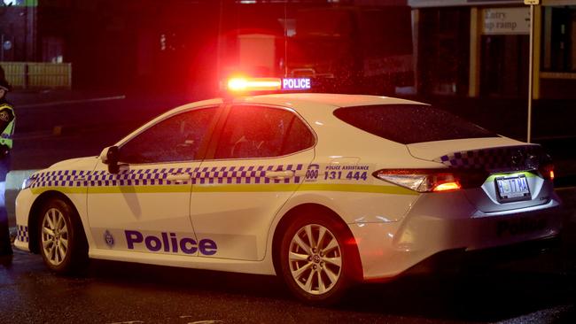 Generic Tasmania Police car. Tas Police. Tasmania Police. Logo. Police lights. Night. dark. Car Crash. Accident. Rain. Picture: PATRICK GEE