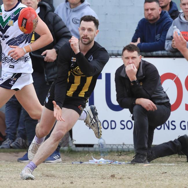 Colac co-coach Darcy Lang in action as the club’s other co-coach Rowan McSparron watches on. Picture: Mark Wilson