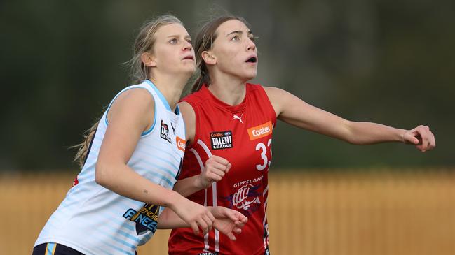 MELBOURNE, AUSTRALIA - June 02: Alexis Gregor of the Pioneers and Maya Crestani of the Power compete in a ruck contest during the 2024 Coates Talent League U18 Girls Round 09 match between Bendigo Pioneers and Gipplsland Power at La Trobe University on June 02, 2024 in Melbourne, Australia. (Photo by Rob Lawson/AFL Photos)