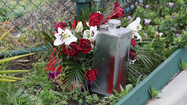 Flowers placed outside St Basil's nursing home in Fawkner. Picture: NCA NewsWire/David Crosling