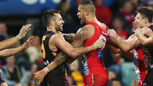 Luke Hodge and Lance Franklin go toe-to-toe. Picture: Phil Hillyard